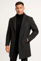 Men's long trench coat with notched lapels, button front and welt pockets