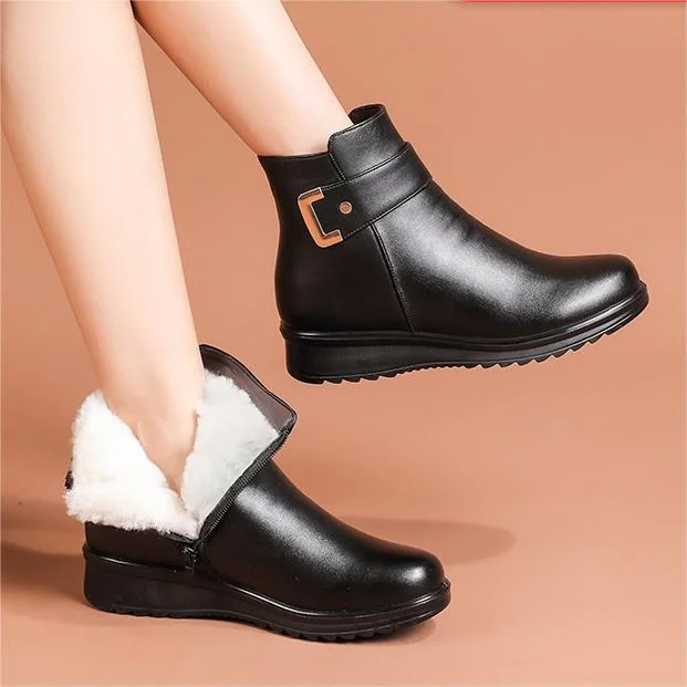Women's plain ankle boots with buckle straps, rounded toes and low heels