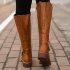 Women's tall plain knee boots with ankle buckle straps, side zips and low block heels