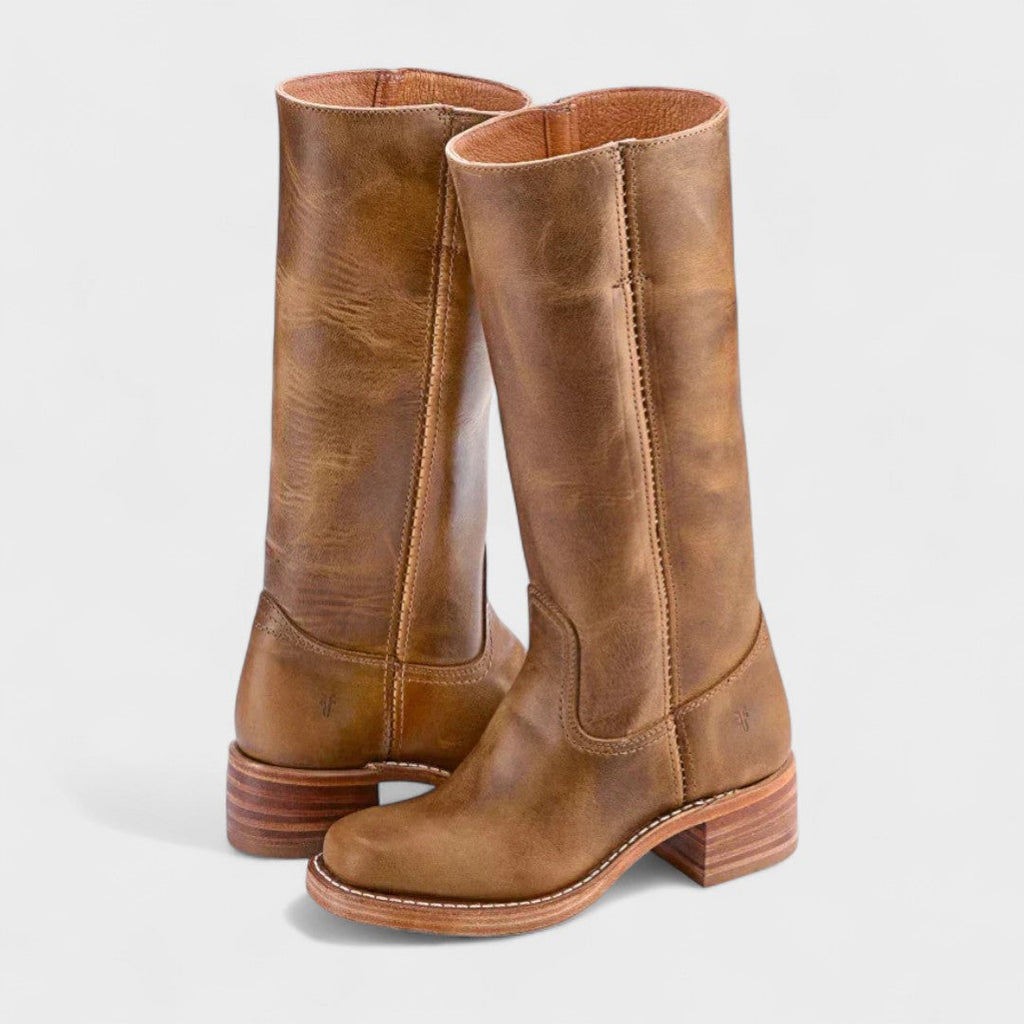 Women's knee-high cowboy boots with rounded toes, stitched panels and low block heels