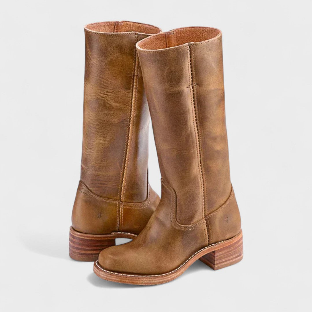 Women's knee-high cowboy boots with rounded toes, stitched panels and low block heels