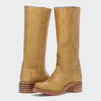 Women's knee-high cowboy boots with rounded toes, stitched panels and low block heels