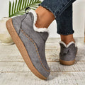 Women's low-cut ankle boots with light trim, stitched detailing and textured flat soles