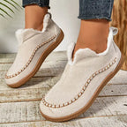 Women's low-cut ankle boots with light trim, stitched detailing and textured flat soles