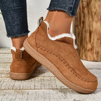 Women's low-cut ankle boots with light trim, stitched detailing and textured flat soles
