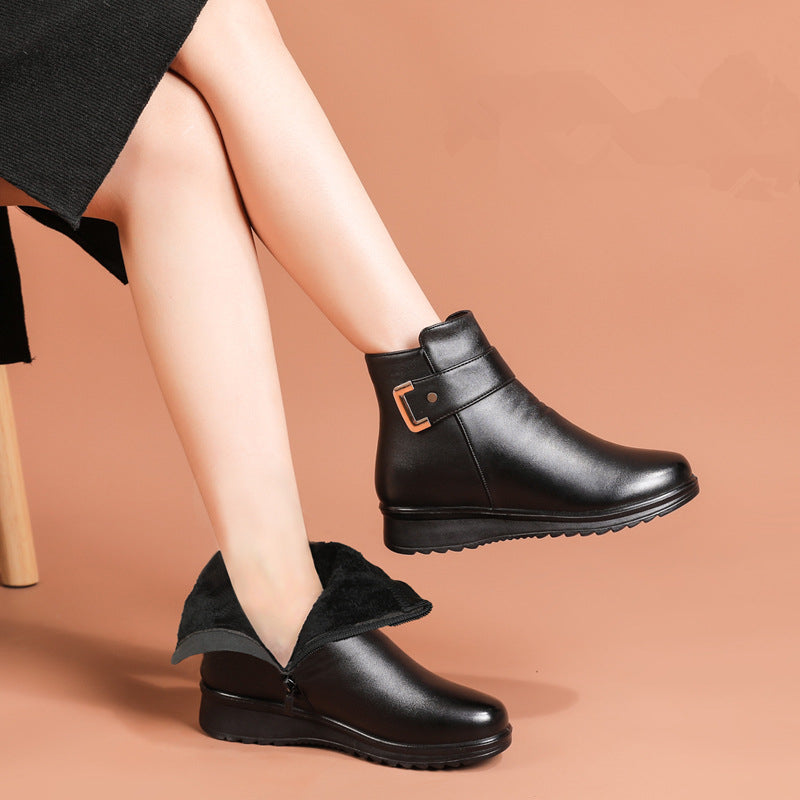 Women's plain ankle boots with buckle straps, rounded toes and low heels