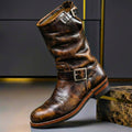 Vintage mid-calf boots with round toes, slouch shafts and buckle straps