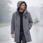 Men's long hooded rain jacket with zip front and slanted flap pockets